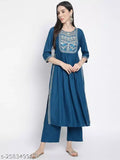 Blue rayon embroidery kurta palazzo set, featuring intricate designs and solid blue color. Perfect for festive occasions or a chic day out