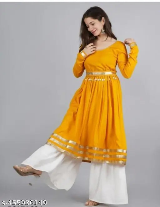 Rayon women's yellow kurta sharara set in solid design, pack of 5 sizes from Hariom Creation, Indian origin
