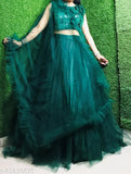 Green jute-silk lehenga with embroidered choli and net dupatta, ideal for mehendi functions or Indian weddings