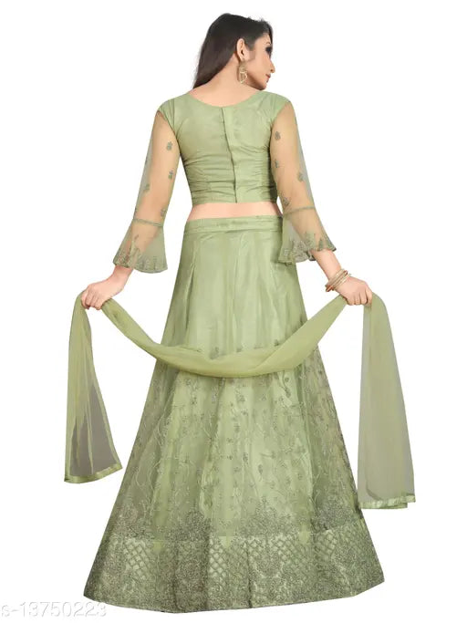 Green embroidered nylon net flared lehenga with unstitched blouse, Indian semi-stitched wedding wear on mannequin