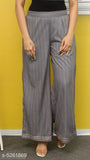 Women's printed rayon kurta with palazzos in three-quarter sleeves, Indian rayon fashion set on mannequin