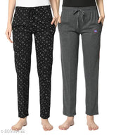 Multicolor cotton blend printed trousers for women, pack of 2. Size options include 32 (28in waist, 38in length), 34 (30in waist, 39in length), 38 (34in waist, 41in length), 40 (36in waist, 42in length). Indian-made fashion trousers on display