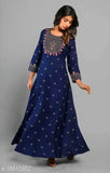 Blue IBBA Women's embroidered rayon A-line kurta with three-quarter sleeves, showcasing intricate Indian craftsmanship on a blue background