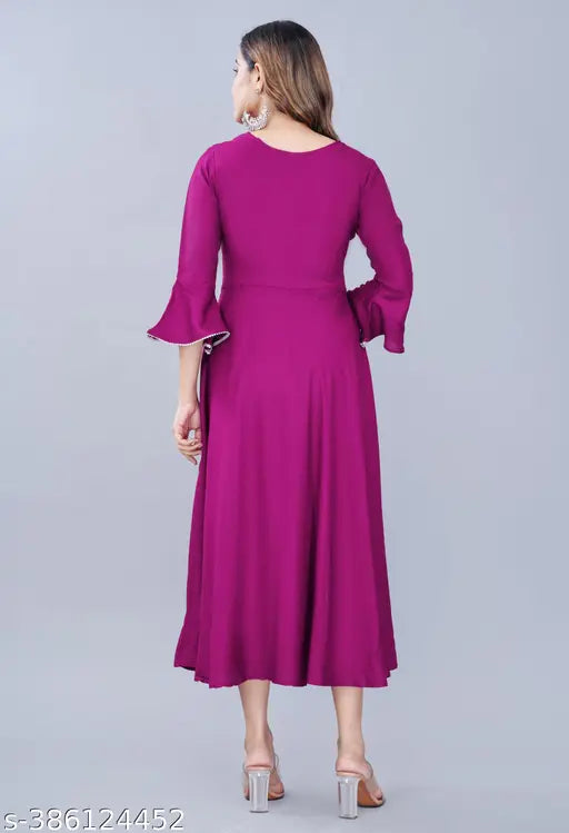 Pink solid rayon women's anarkali flared kurti (M-XXL), three-quarter sleeves, Indian fashion trend