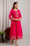 Rayon women's three-quarter sleeve anarkali kurti/kurta, solid design, S-XXL sizes. Anarkali kurti in traditional Indian style on a model wearing accessories