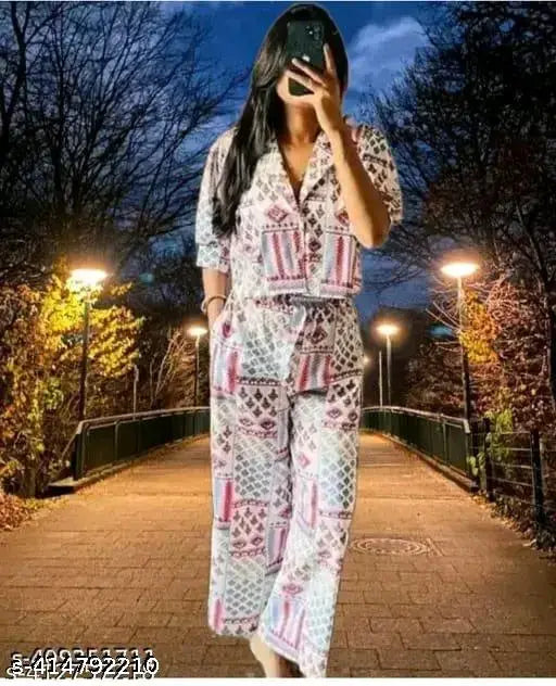 Trendy polycotton summer jumpsuit dresses with printed net pattern, short sleeves. Two pieces set available in sizes XS, S, and M