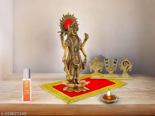 Handcrafted aluminum gold tabletop figurine of Bhagwan Chaturbahu Vishnu on red velvet carpet, with DIYA oil lamp and moti mala. Premium artwork for Satya Narayan vrat, Ekadashi, Lakshmi pooja, Diwali, and car dashboard decor