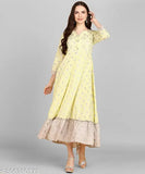 Light yellow poly-cotton printed A-line kurta with three-quarter sleeves, embellished with zari work. Indian fashion for women." (106 characters)