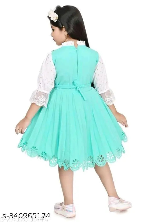 Green cotton kids party dress, three-quarter sleeves, embroidered net pattern, knee-length style - India