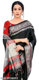 Ikat silk black saree with tassels and blouse - handwoven Indian fashion accessory in soft silk