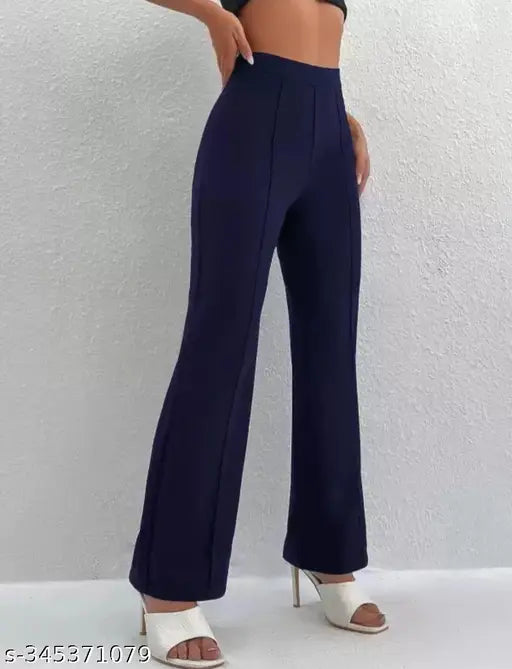 Women's trendy cotton blend ballbottom. Solid, elastic, easy-to-wash pants with a creative look. Available in sizes 28, 30, 32, 34, and 36 (waist: 28in-36in, length: 34in-38in, hip: 11in-15in). Made in India