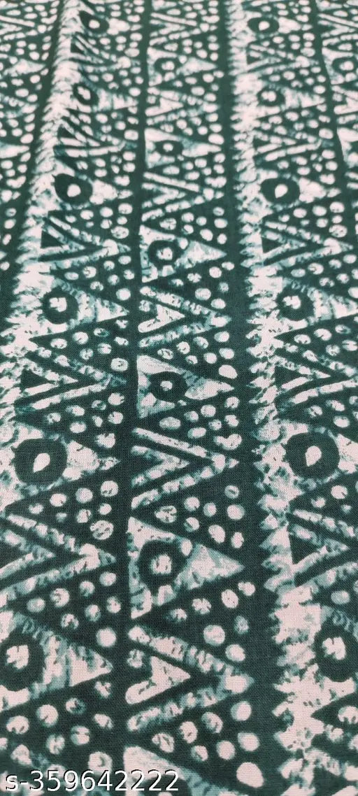 Green printed rayon kurti with three-quarter sleeves, chevron and discharge print embroidery work. Comfortable for all occasions, ideal for women's dressing