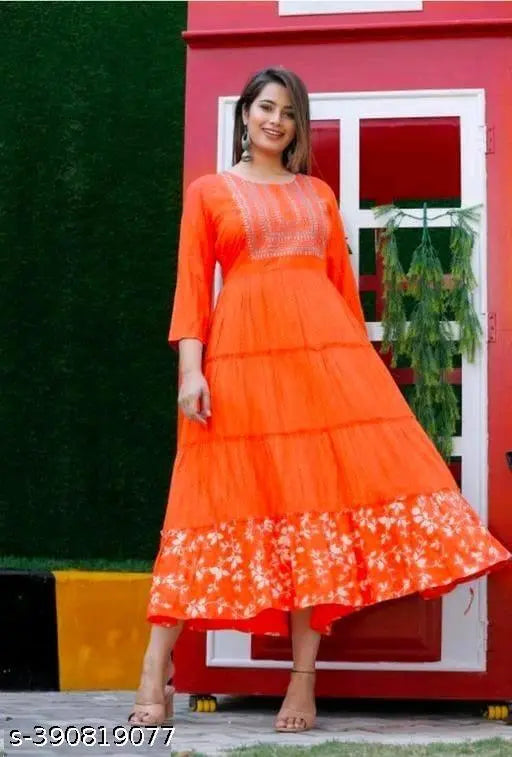 Rayon Anarkali kurti with embroidery, three-quarter sleeves, printed design. Exudes timeless elegance and sophistication, crafted in India. Size M (Bust 38in, Length 43in), L (Bust 40in, Length 43in), XL (Bust 42in, Length 43in), XXL (Bust 44in, Length 43in), XXXL, 4XL (Bust 48in, Length 43in)