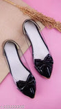 Patent leather, ballerina-style women's bellies with ankle loops. Transparent and versatile for casual to formal wear. Made in India (IND-3 to IND-10 sizes)