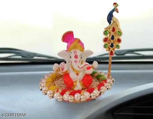 Golden Ganesha statue with gold-plated plate, free tilak stick - Decorative Indian dashboard idol for Diwali or birthday gifts. Material: poly resin, dimensions: 10cm x 10cm x 10cm