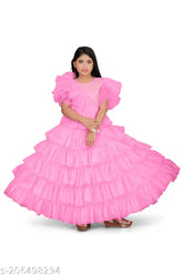 Stitched net gown for kids and young girls, solid color, perfect for parties and festive seasons like Raksha Bandhan, Navratri, Diwali, Christmas, New Year. Long this lehenga choli with statement earrings & high heels. Dry clean only, sizes 4-16 years, made in India
