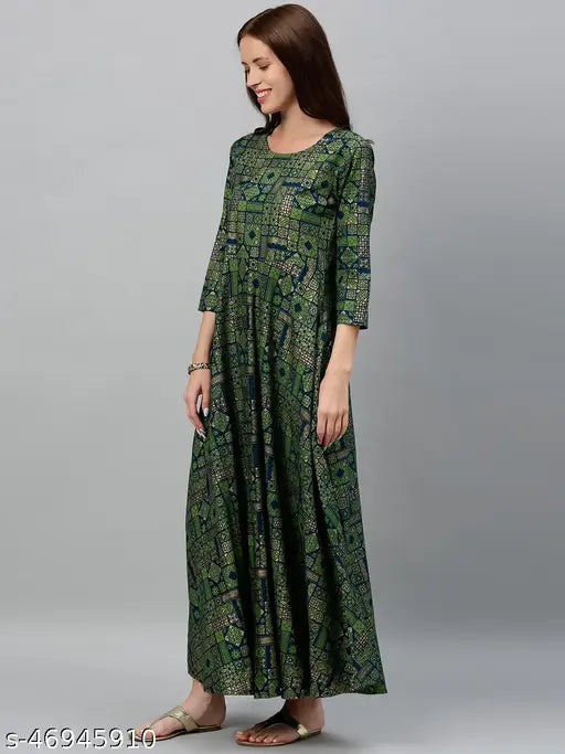 Dark green rayon slub Anarkali with Mughal prints, perfect for ethnic wear. Indian-made design with three-quarter sleeves." (125 characters)