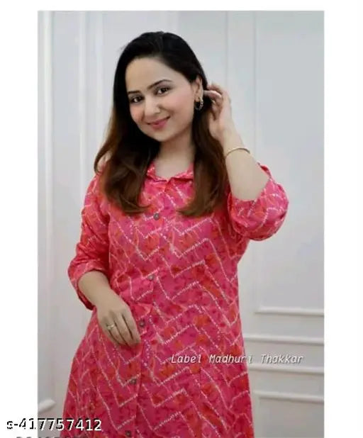 Pink rayon three-quarter sleeve Anarkali ALine printed heavy Kurta set for women, vibrant Indian fashion for functions and occasions