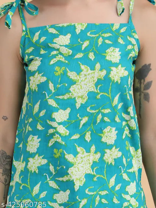 Trendy green rayon short kurti with floral print and ruffle styling, ideal for effortless casual wear. Soft, breathable fabric ensures comfort and durability. Perfect for summer, this vibrant design is versatile and fashionable. Made in India