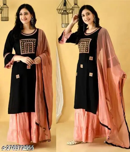 Rayon Reshma Kurta Set with Sharara bottoms, embroidered net dupatta, three-quarter sleeves. Indian ethnic wear set in rayon fabric