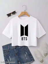 White polyester BTS Design crop top for girls with printed net pattern, short sleeves and rounded neckline