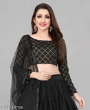Satin lehenga set with net dupatta, free size, Indian traditional topwear and bottomwear on display