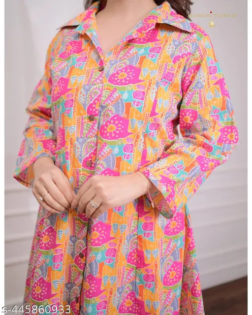 Rayon printed net kurta set for woman with long sleeves and pants, available in various sizes from M to 4XL. Indian-made stylish kurti and bottomwear set on display