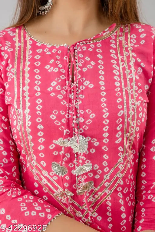Pink cotton rayon blend Bandhej print straight kurta sharara with three-quarter sleeves, Indian women's traditional outfit on display