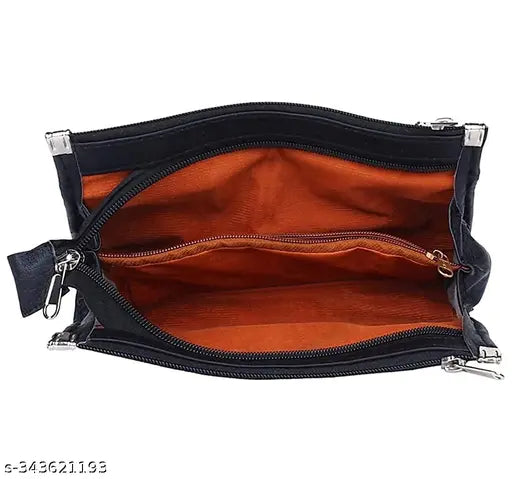 Black PU leather LSGF Styles Moneey Hand Purse, ideal for girls and women. Solid pattern, 3 compartments, free size (8"x18"). Accessorize your look with this stylish zip closure clutch. Made in India