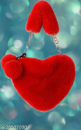 Plush pink PU heart-shaped sling bags with pom pom balls, soft faux fur, detachable chain strap, ideal for girls & events