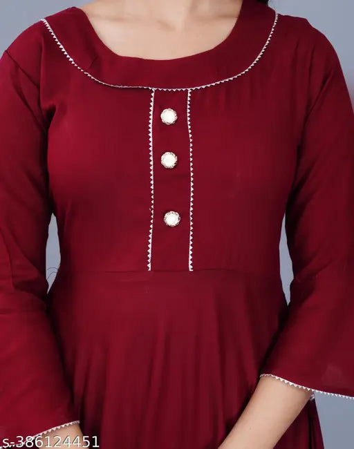Maroon solid rayon women's Anarkali flared kurti with three-quarter sleeves, popular Indian fashion trend