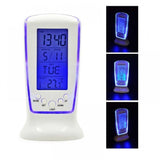 Assorted color digital square table clock with blue border LED light, displays date, time, month, temperature, and alarm. Essential home accessory