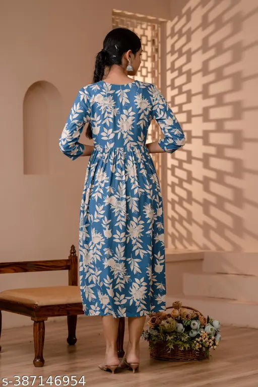 Rayon embroidered and printed Anarkali kurti in a print combo, featuring three-quarter sleeves. Size range: S-5XL. Indian women's fashion accessory on display
