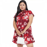 Maroon polyester women's casual shirt with short sleeves on hanger