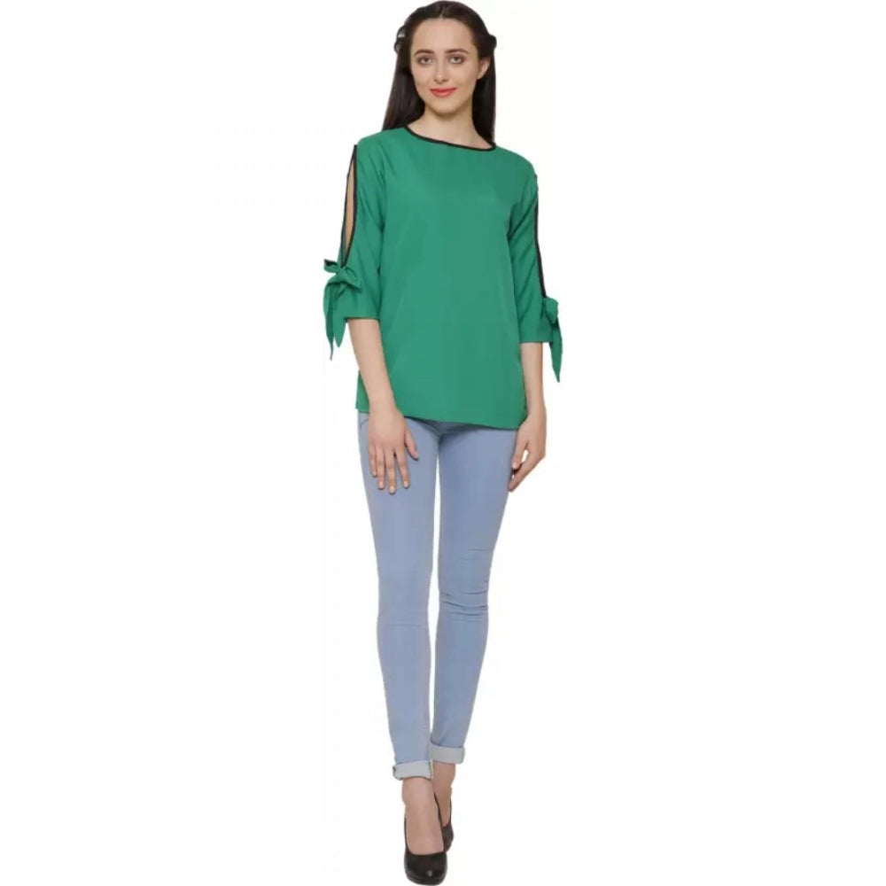 Green poly crepe women's casual slit sleeve top on model for outdoor events