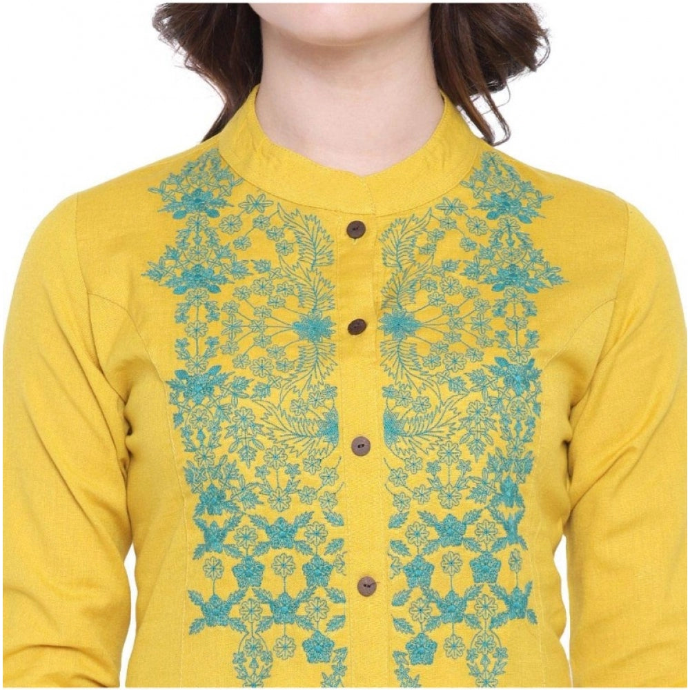Yellow Khadi embroidered kurti with Mandarin collar and three-quarter sleeves, traditional Indian women's clothing on display