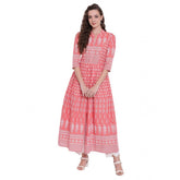Peach cotton printed regular kurti with mandarin neck and three-quarter sleeves, ideal for women's casual wear