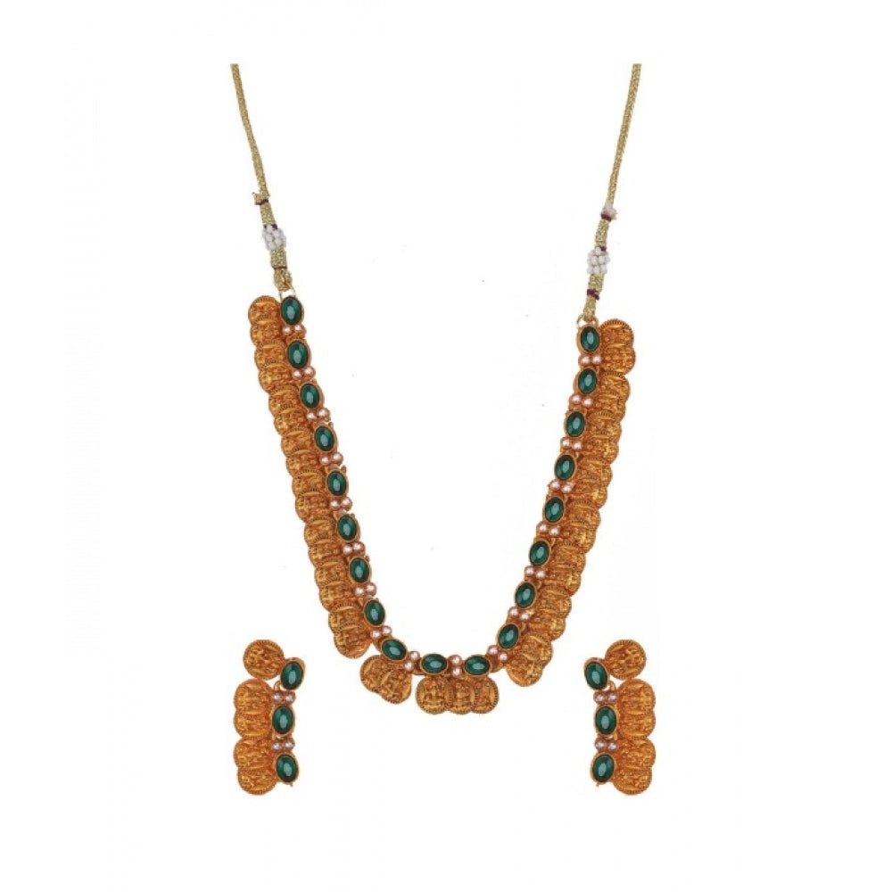 Green brass laxmi coin shape women's jewelry chowker set, gold plated on display stand