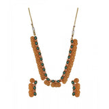 Green brass laxmi coin shape women's jewelry chowker set, gold plated on display stand