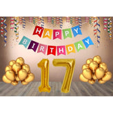 Multi-colored Happy Birthday banner set with gold balloons and foil numbers, eco-friendly and safe for children's parties