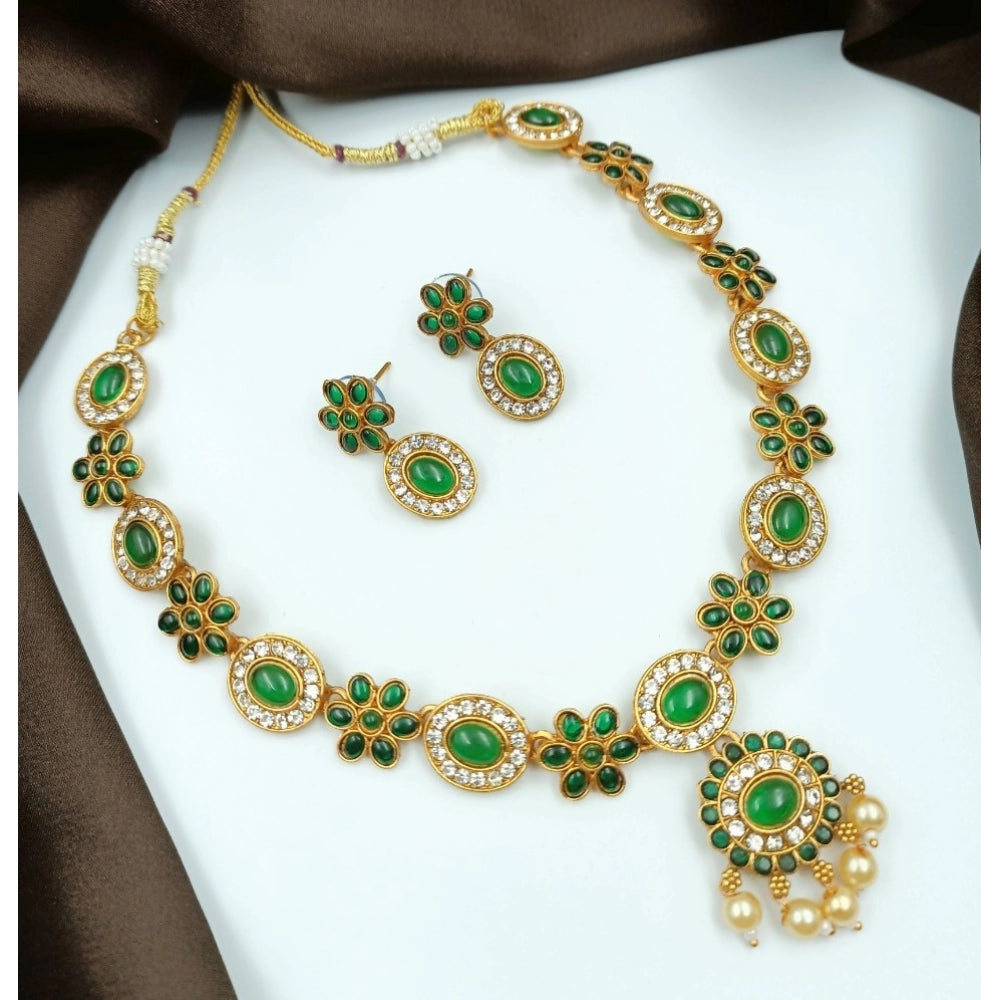 Green gold-plated brass Women's Temple Elegance necklace and earrings set, close-up view