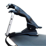 Black plastic mobile phone holder for enhanced safety while driving, keeps phone stable and in line with road view