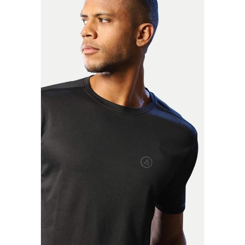 Black polyester men's casual half-sleeve crew neck t-shirt with solid design, regular fit on a clothing rack