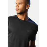 Black polyester men's casual half-sleeve crew neck t-shirt with solid design, regular fit on a clothing rack