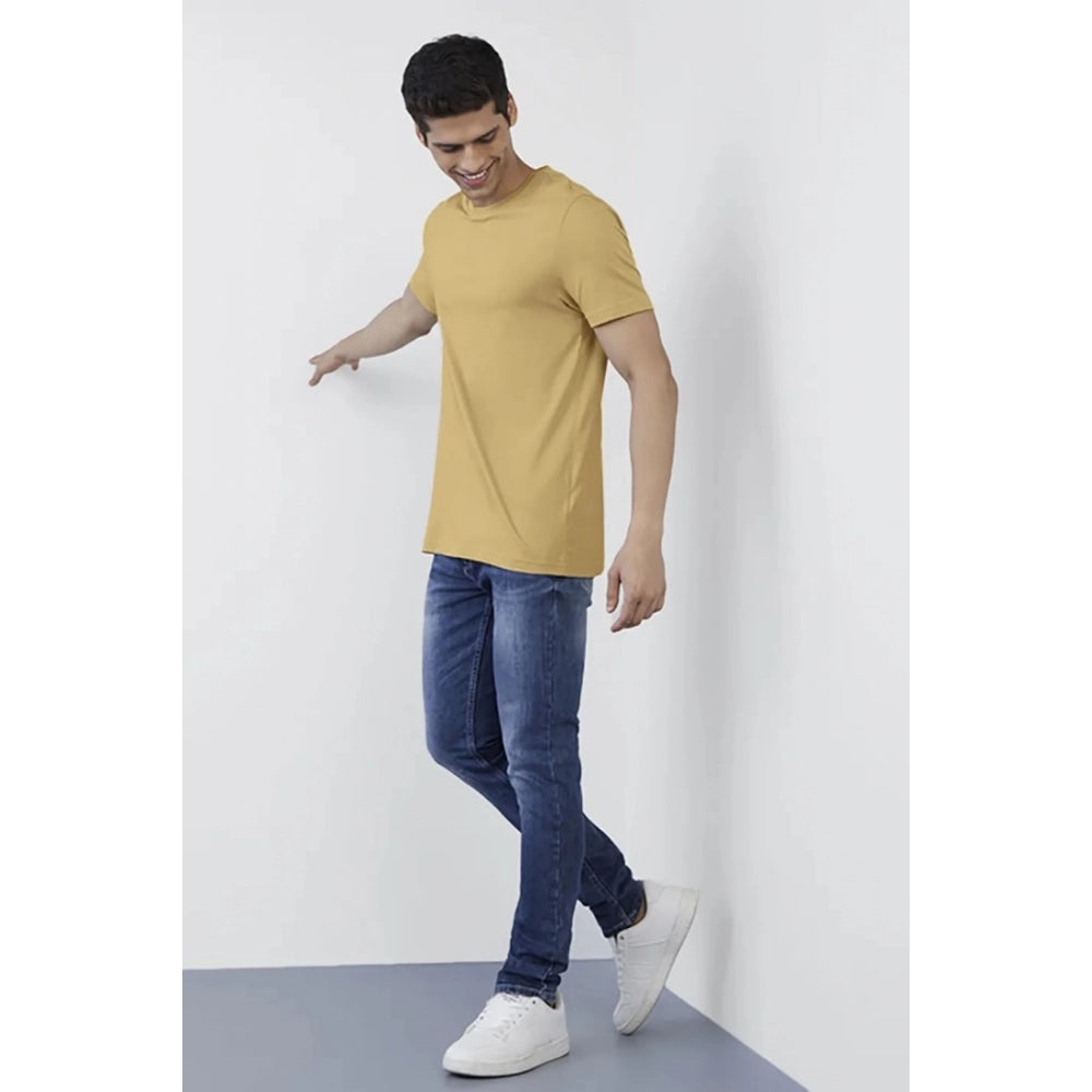 Men's casual sand polyester half sleeve crew neck solid t-shirt on mannequin, regular fit