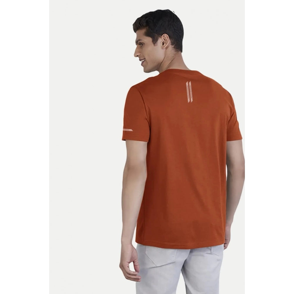 Men's rust polyester half sleeve crew neck solid t-shirt on model, casual fit for everyday wear
