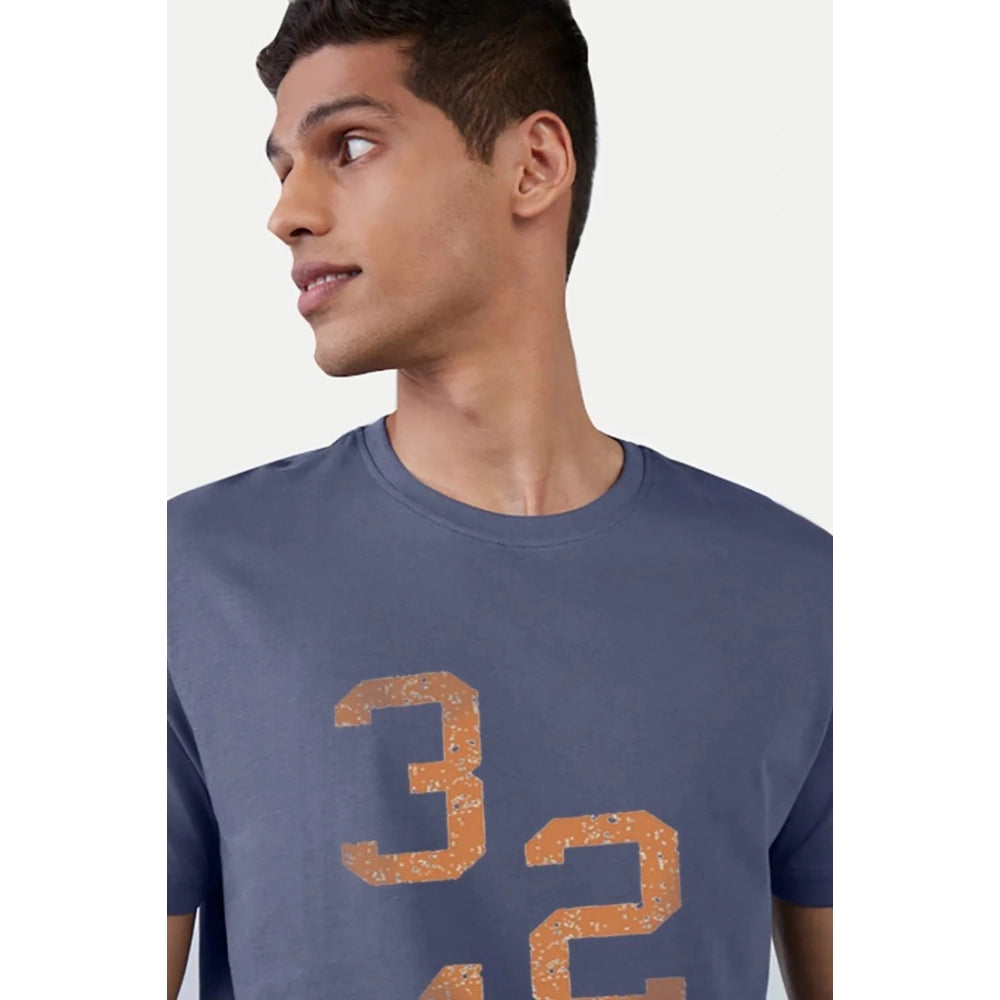 Blue printed cotton men's casual half sleeve crew neck T-shirt with comfortable fit, featuring vibrant imagery on sleeves and chest