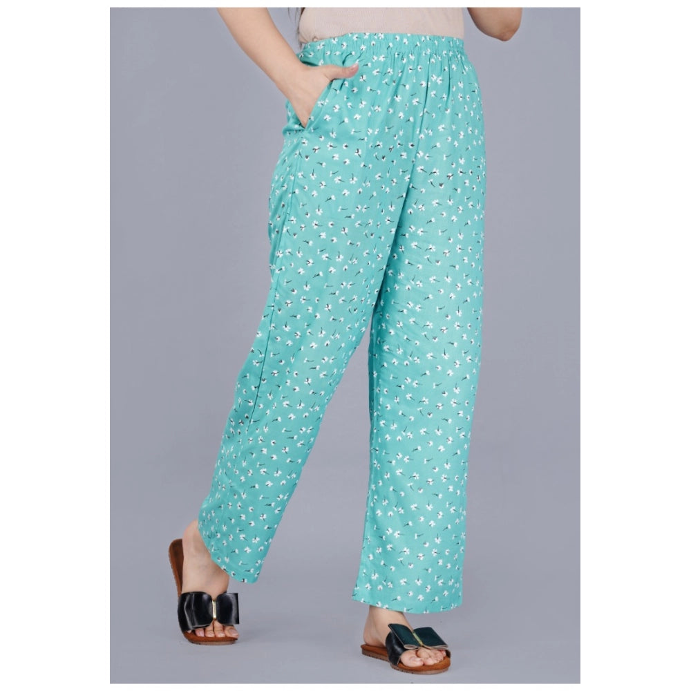 Green viscose rayon casual shirt set with printed pyjama pants for women on display