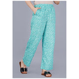 Green viscose rayon casual shirt set with printed pyjama pants for women on display