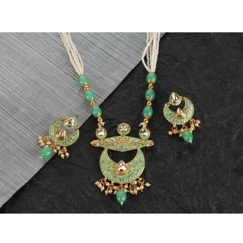 Rose gold plated alloy necklace & earrings set - green color on display stand